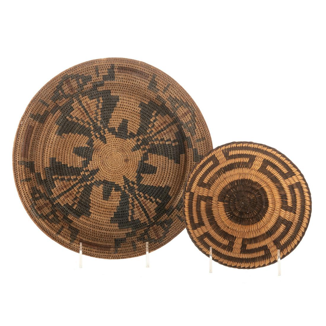 Two Indian Baskets: circular basket with geometric pattern decoration, possibly Apache, 11 in. Diam., circa 1930s and similar coil basket, 7 in. Diam. From the Estate of Philip Dubey.