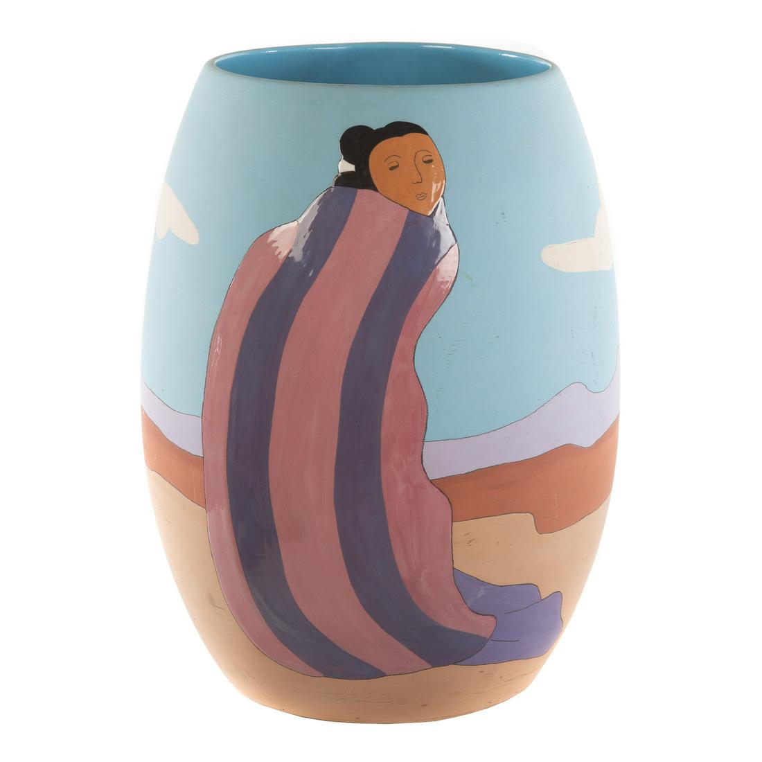 R. C. Gorman, Painted Pottery Vase: (Native American, 1931-2005) decoration of Native American woman in desert landscape, with clouds in sky, signed "R. C. Gorman," 17/150. 19 in. H., 10 in. Diam.