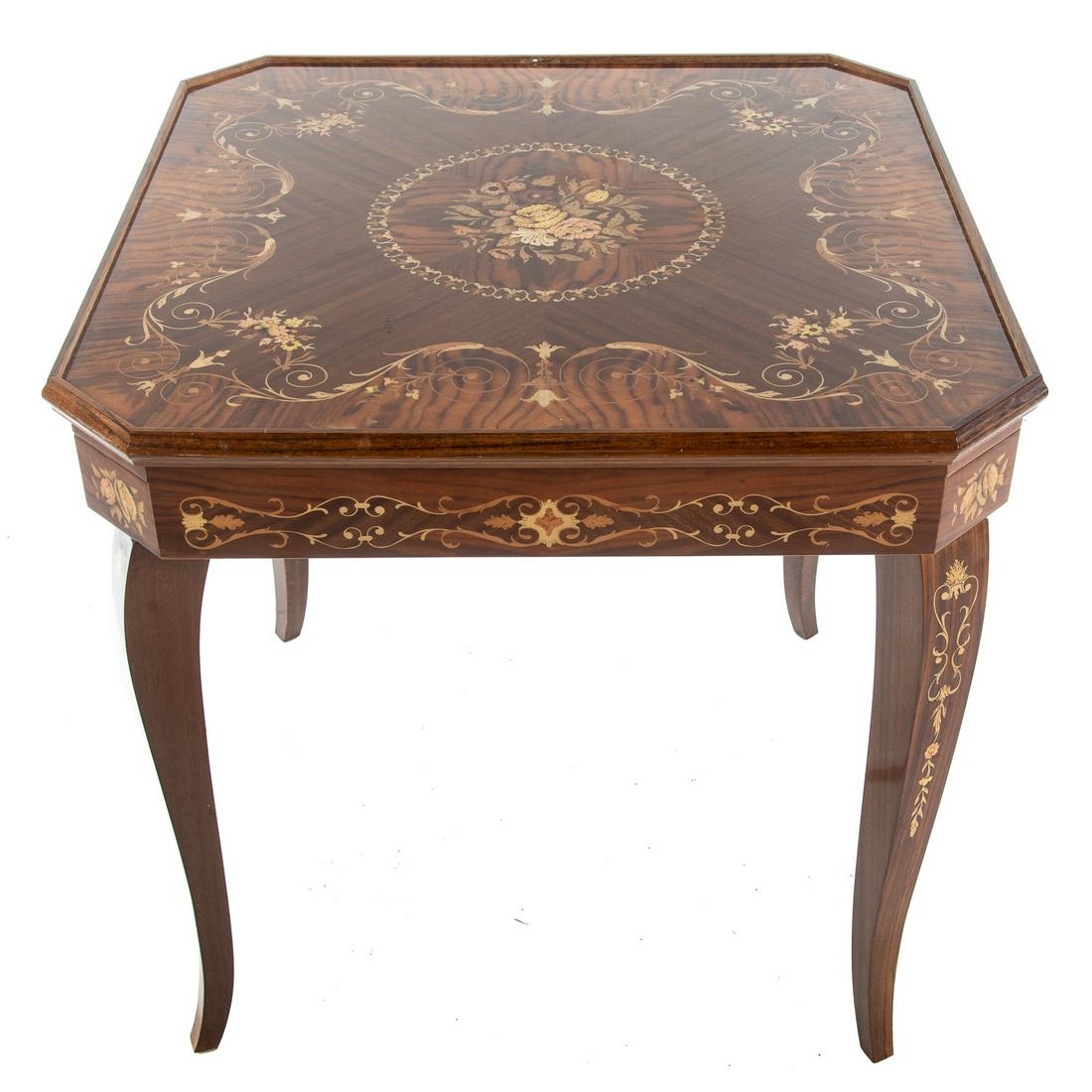 Continental Marquetry Inlaid Games Table: With removable top, opens to reveal multiple games including backgammon, checkers/chess, and a roulette wheel. 30 in. H., 30 in. W., 30 in. D.