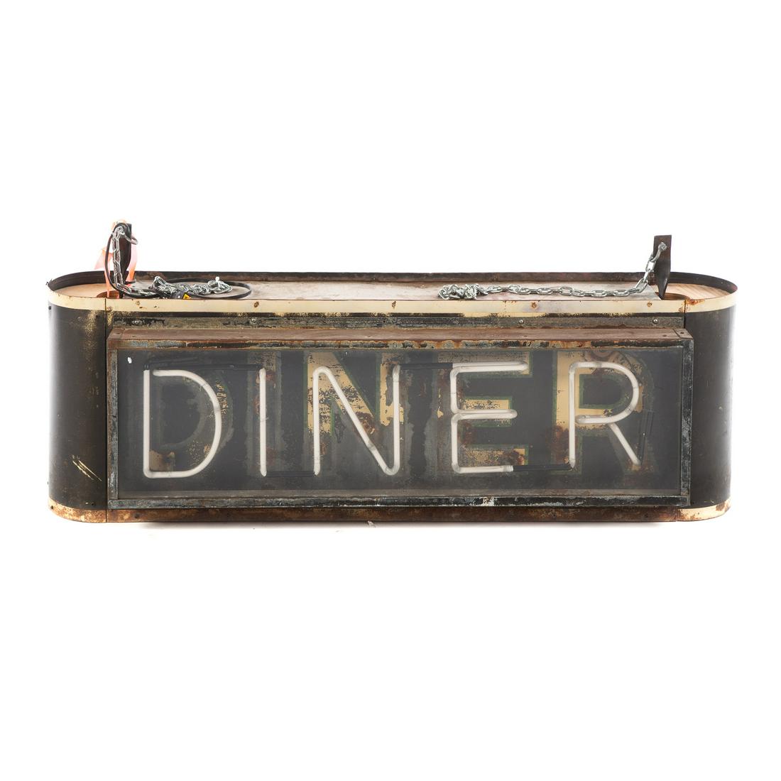 Large Neon Diner Sign: Circa 1950s; large oval hanging sign, with neon "DINER" on both sides, having hanging chains,with electrical plug, 25 in. H., 57 in. L,. 18 in. W.