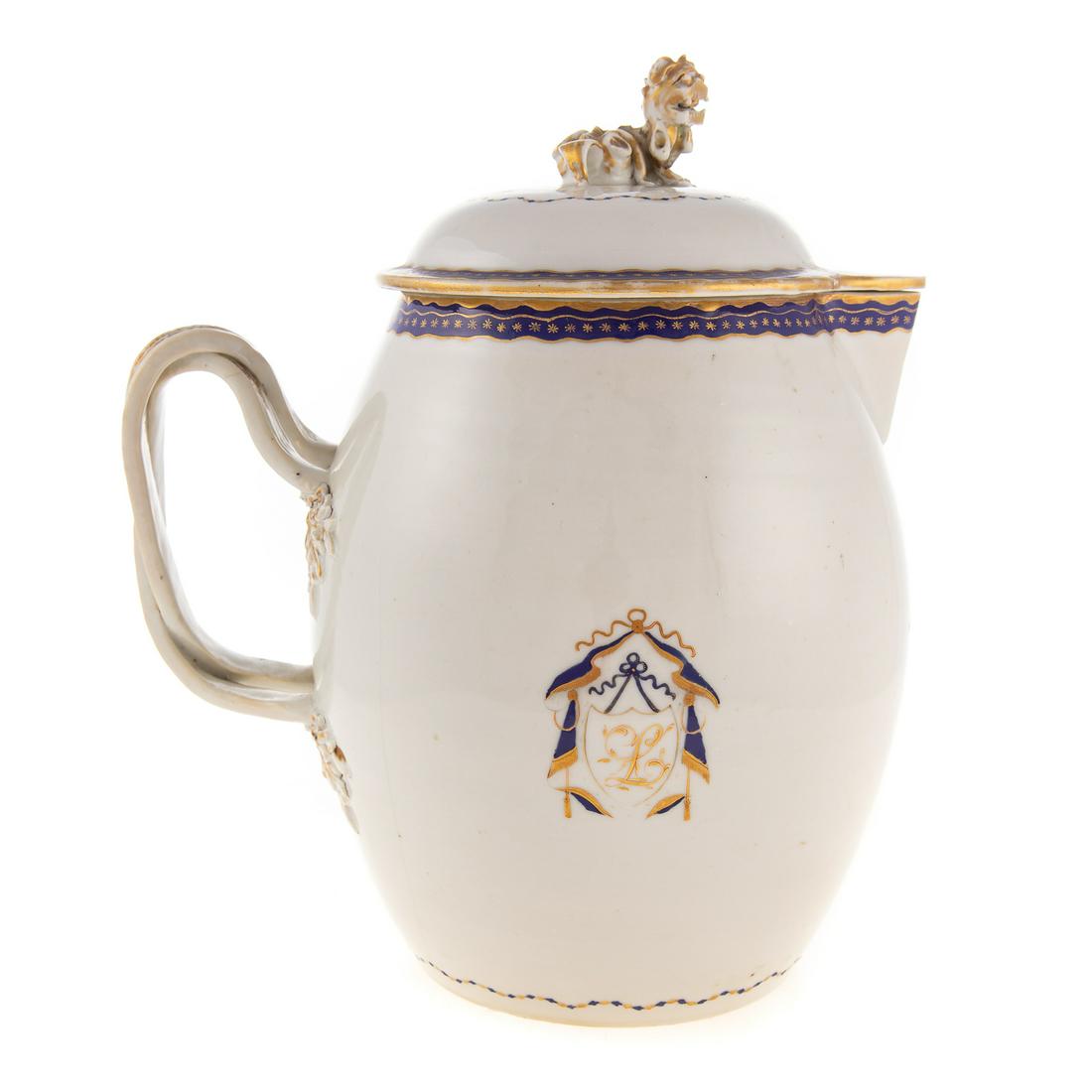 Chinese Export Flagon/Cider Jug: Circa 1800; for the American market, bulbous form with double strap handle and lid with foo dog knop, drape and shield decoration, 10 1/2 in. H. From the Estate of Philip S. Dubey.