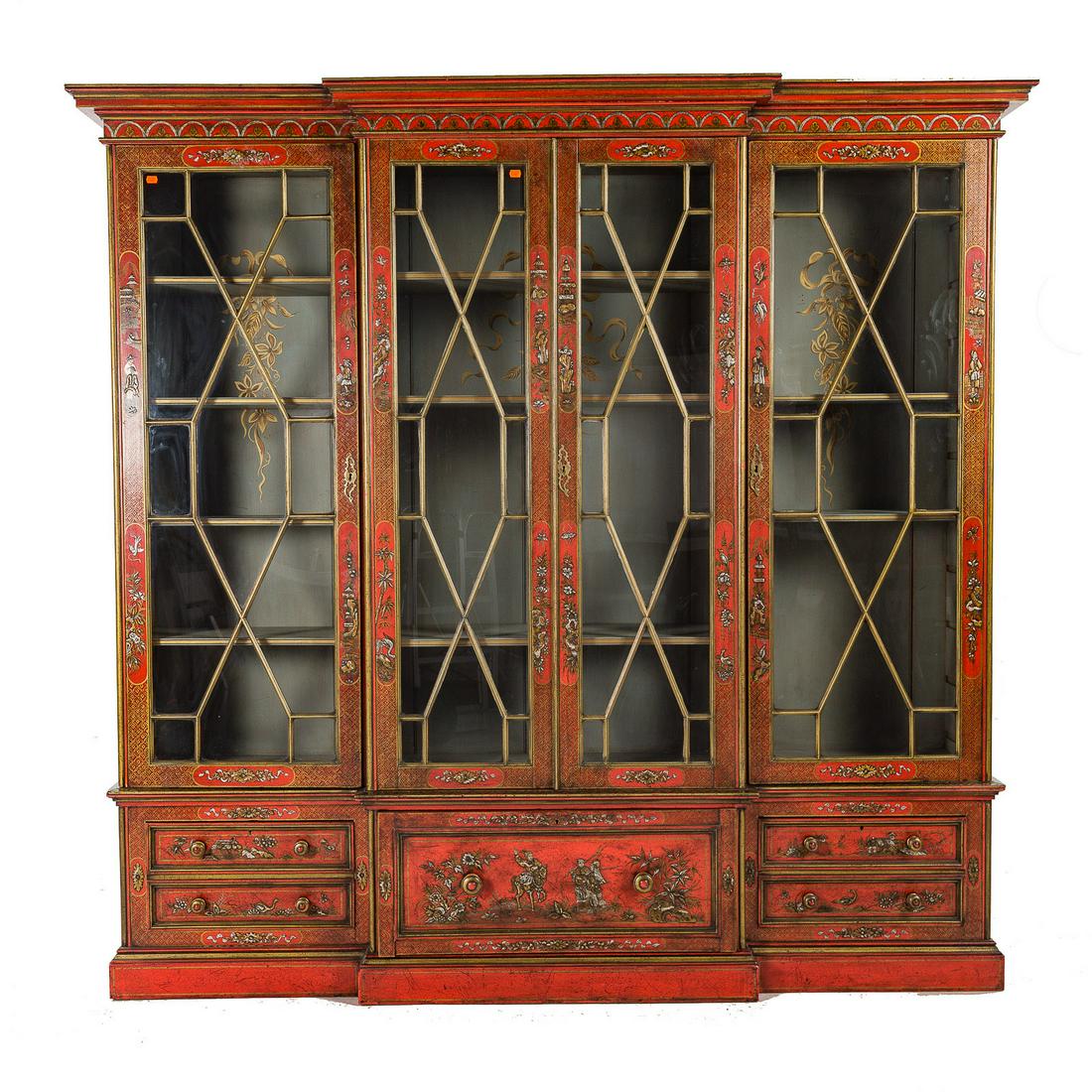 George III Style Chinoiserie Jappaned Bookcase: Signed Doveston, Bird & Hull, late 19th century; in five parts, breakfront molded edge top, three painted compartment with shelving enclosed by four glazed doors, lower compartment with three deep dra