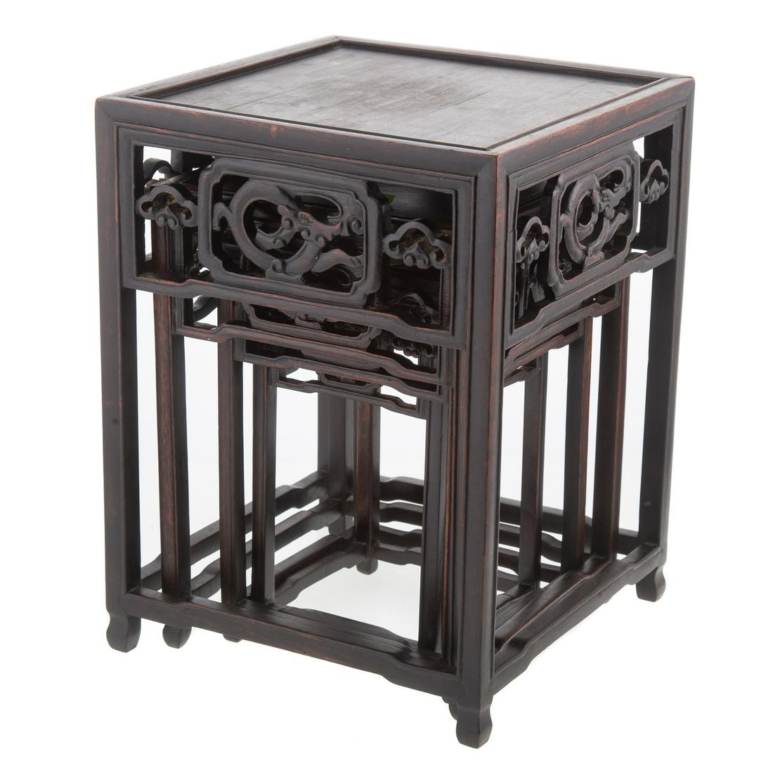 Set of Four Chinese Carved Nesting Wood Stands: Circa 1920-30; square carved stands with fretwork sides, largest - 11 1/2 in. H., 9 in. Sq.