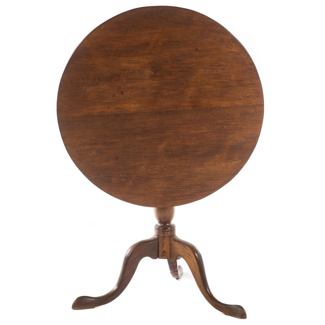 George II Queen Anne Style Tilt-Top Tea Table: 19th century; walnut and oak tilt-top tea table. 28 in. H., 30 in. Diam., 45 in. H, when in tilted position.
