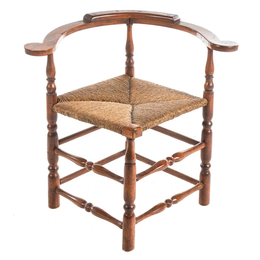 George III Elmwood Corner Chair: With rush seat, 25 in. H., 28 in. W., 23 in. D.