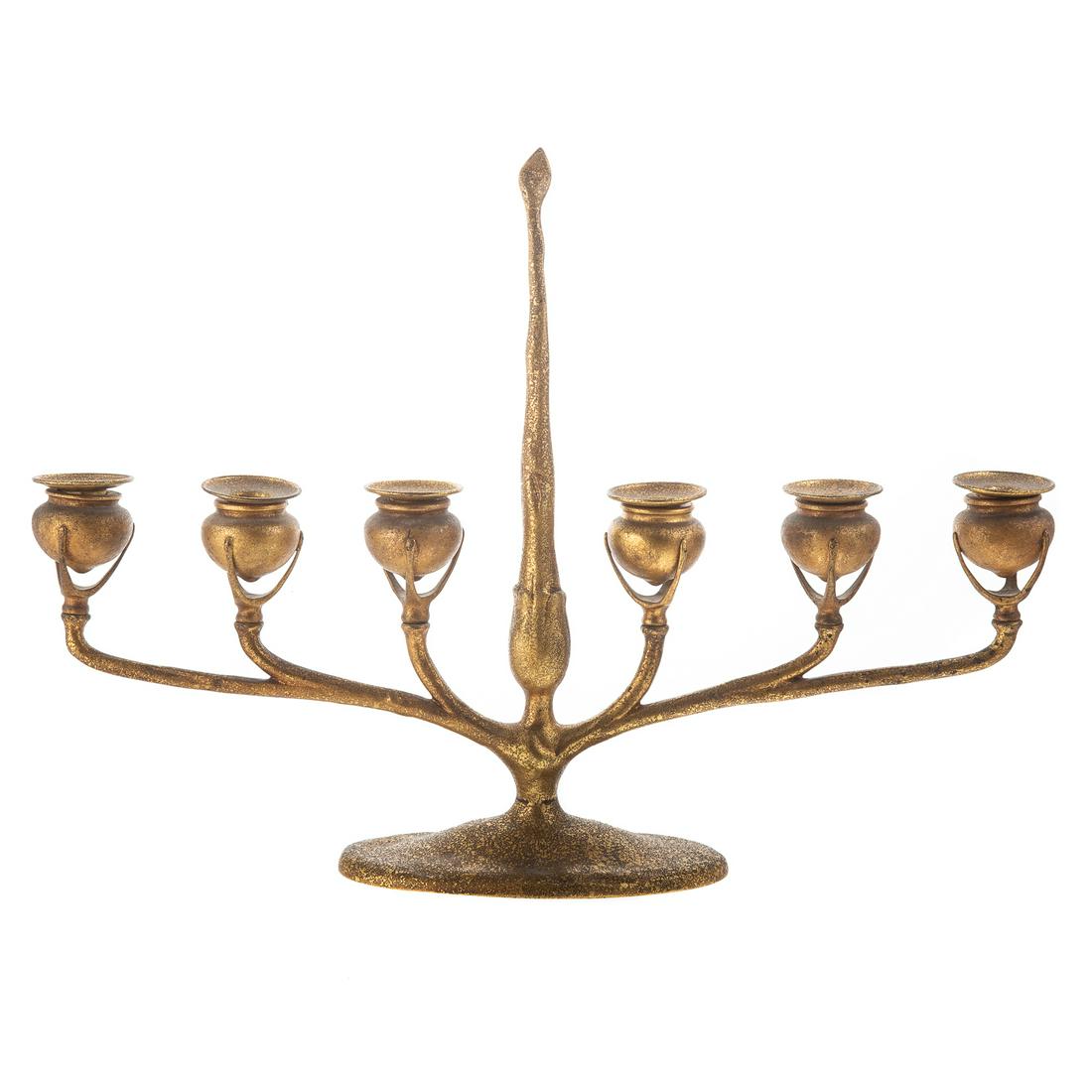 Tiffany Gilt Bronze Six Light Candelabra: Early 20th century; menorah style having built in candle snuffer, removable bobeches, on pot form sockets, stamped "Tiffany Studios New York 1209," 15 1/4 in. H., 21 in. W.