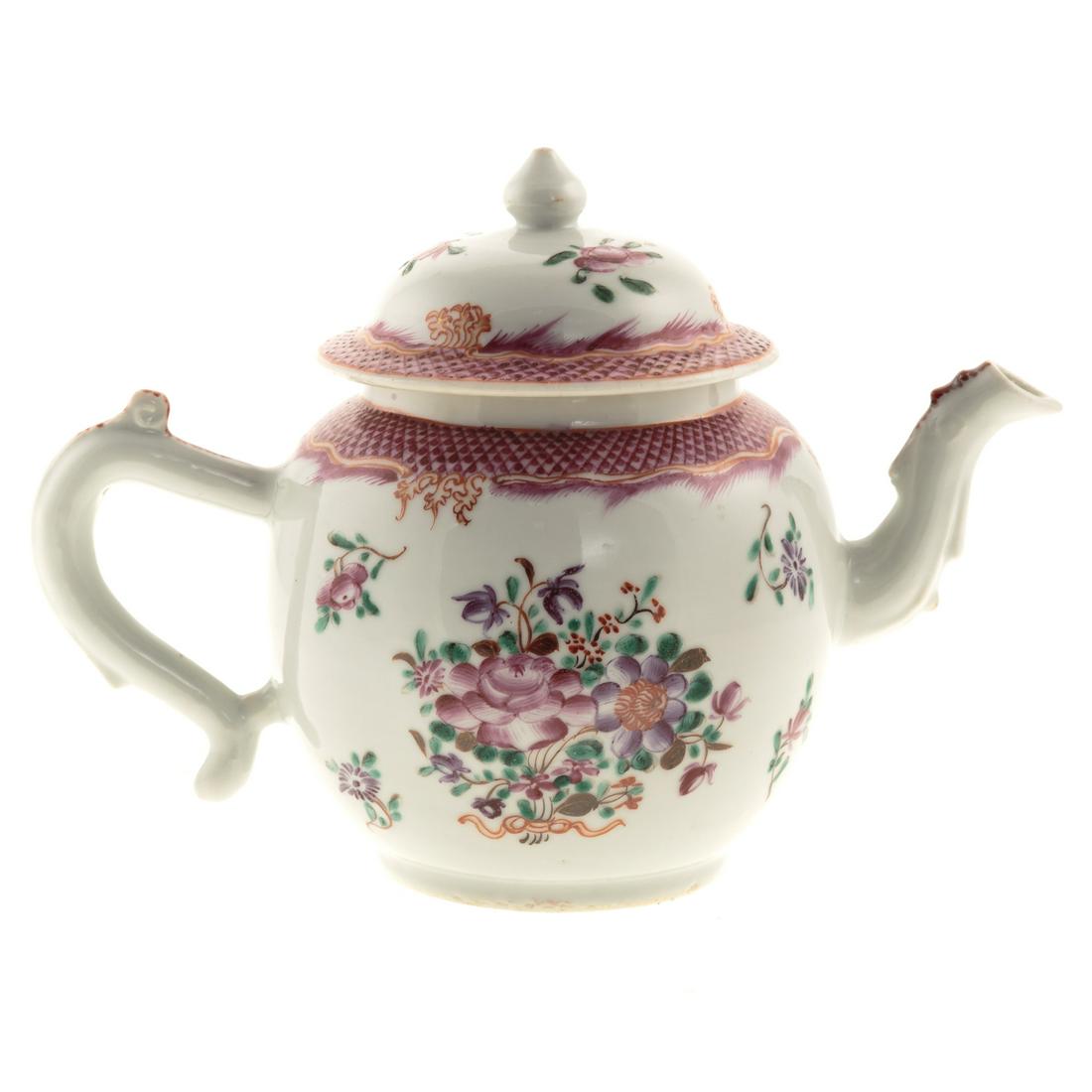 Chinese Export Famille Rose Globular Teapot: Circa 1770; fish scale border with floral decoration, 5 in. H. From the Estate of Philip S. Dubey.