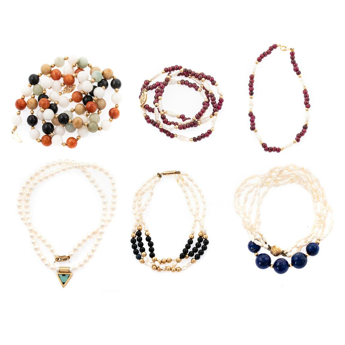 A Collection of Pearl and Beaded Necklaces: Including multi colored jade beaded necklace with 14K yellow gold fishhook clasp, 28 in. L., 3 bracelets with 14K yellow gold clasps featuring fresh water pearls, black onyx and garnets, 2 necklaces f
