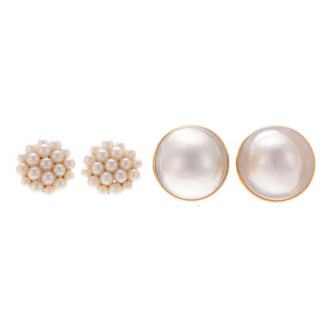 Two Pairs of Large Pearl Earrings in 14K: 1) 14K yellow gold Mabe blister pearl earrings, each pearl measuring 23 mm W., set in simple bezel with post and Omega backs, 1 in. W. and 2) 14K yellow gold pearl cluster earrings featuring 19 cultur