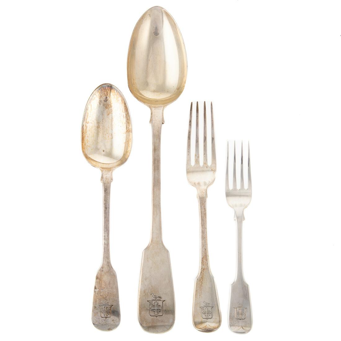 Assembled George III & Victorian Silver Flatware: By various makers. Including twelve forks (8 1/8 in. L.), twelve forks (6 5/8 in. L.), eight dinner spoons (8 3/4 in. L.) and two stuffing spoons (11 7/8 in. L.); 34 total pieces, each with armorial c