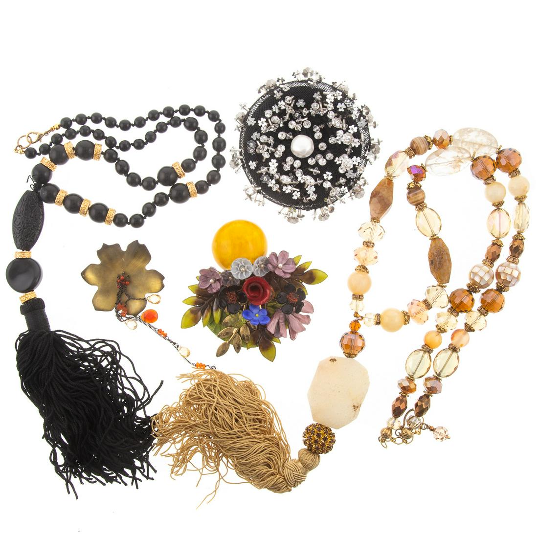 Collection Designer & Other Costume Jewelry: Including a Fabrice, Paris brooch, Alexis Bittar brooch, two beaded tassel necklaces, and an embellished fabric brooch.