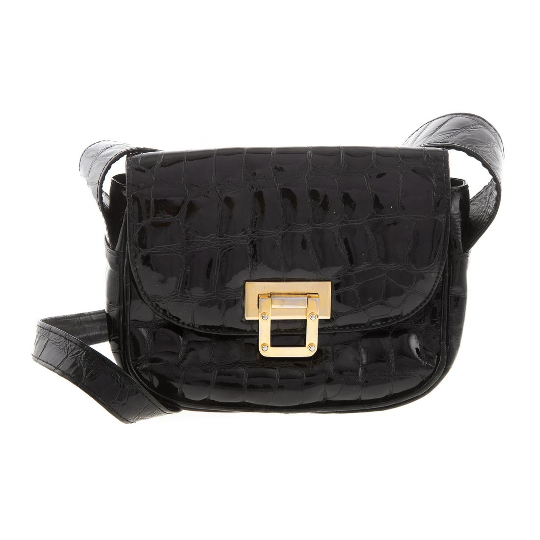 A Stuart Weitzman Patent Leather Croc Bag: Black patent leather crocodile embossed Stuart Weitzman shoulder bag with gold-tone hardware, single shoulder strap, black leather lining with slip pocket and buckle closure at front. Shoulder strap d