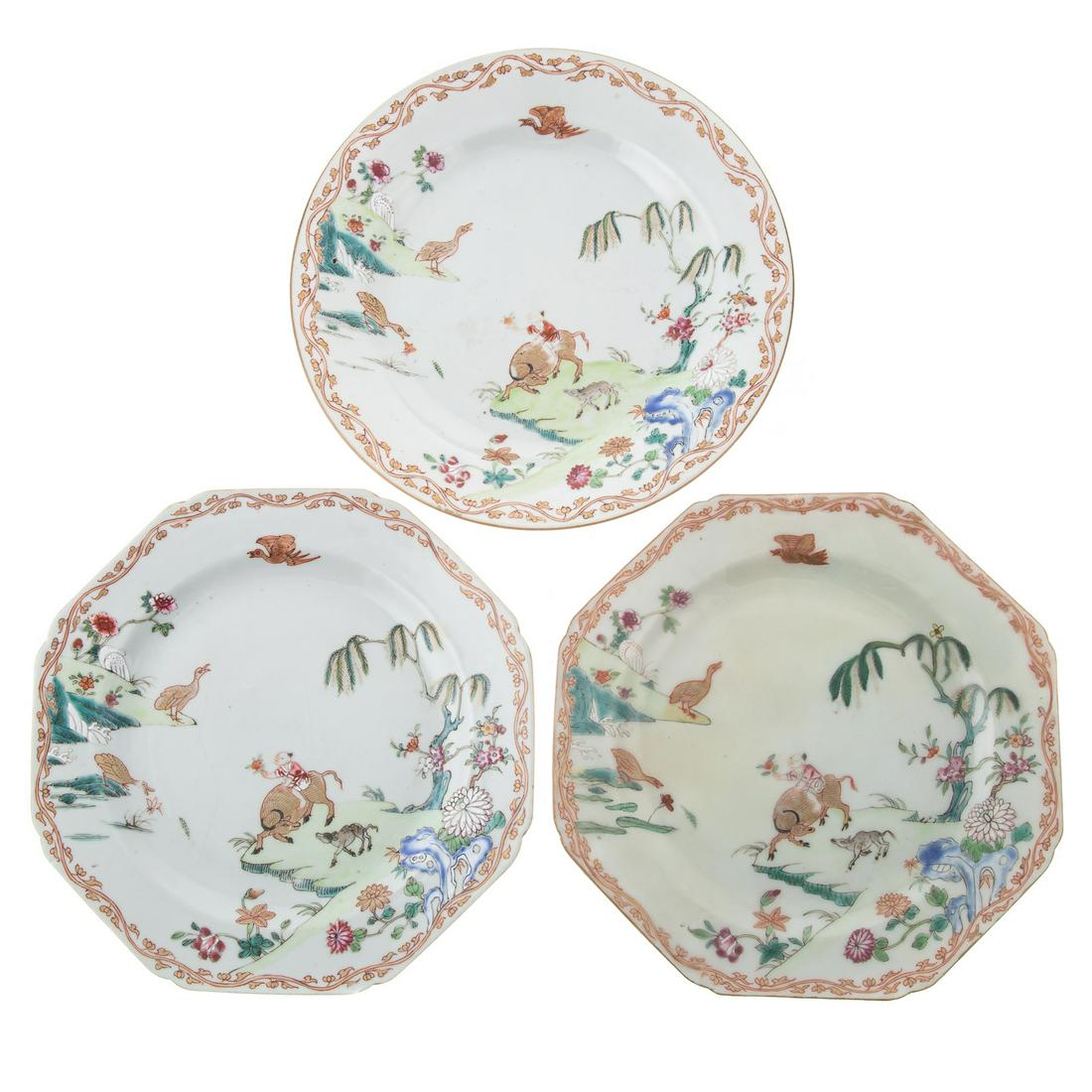 Three Chinese Export Famille Rose Plates: Circa 1770; two octagonal and one circular plates, all with same decoration of boy ox rider with gilt birds and Famille Rose flowers and polychrome plants and landscape, having gilt vine border, 9 in.