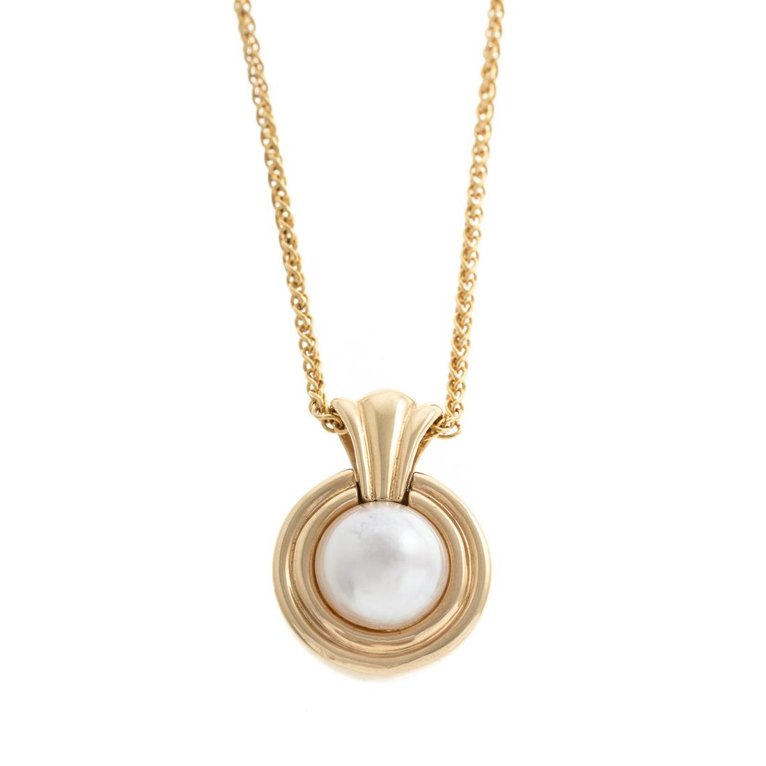 A 14K Mabe Pearl Pendant on a 14K Gold Chain: 14K yellow gold pendant featuring a mabe pearl, measuring approx. 11 mm D, 1 in. L, on a 14K yellow gold wheat chain, lobster clasp, 19 in. L, 13.7 grams tw