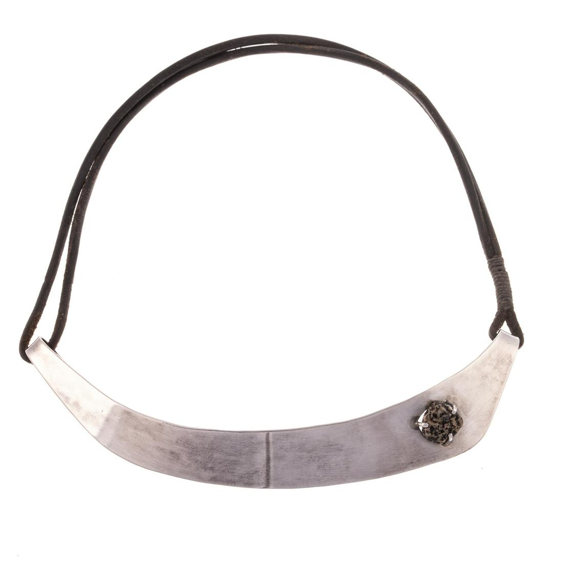 An Early Sterling Silver Choker by Betty Cooke: A sterling silver choker created by iconic Baltimore Jewelry designer Betty Cooke, dating to 1950-1960s, curved freeform choker with prong set unpolished zebra jasper, leather cord removable by hook,