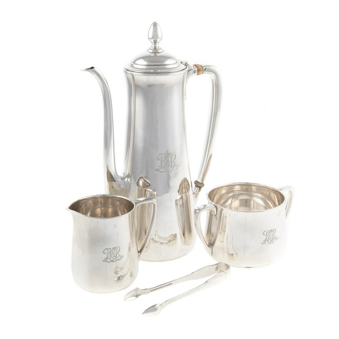 Tiffany & Co. Sterling Coffee Service: 1907-1947 date mark, pattern# 20999; comprising tall coffee pot, with 5 1/4 gills capacity, creamer, and sugar with tongs; in the Art Deco style, with "RER" monogram; coffee is 9 in. H, 28.15 ozt.
