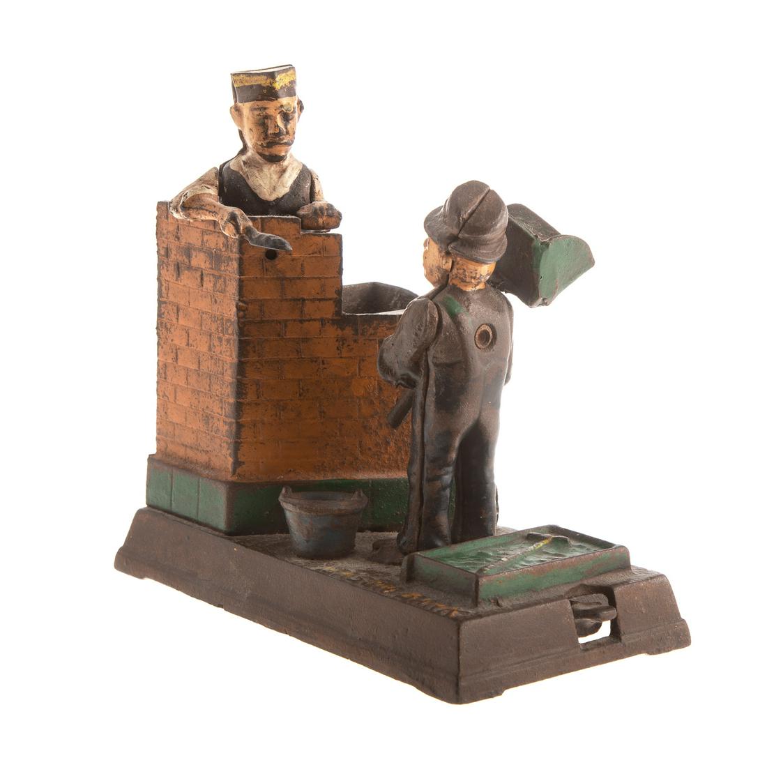Painted Cast Iron Mechanical Mason Bank: By Shepherd Hardware & Co. 7 in. H.