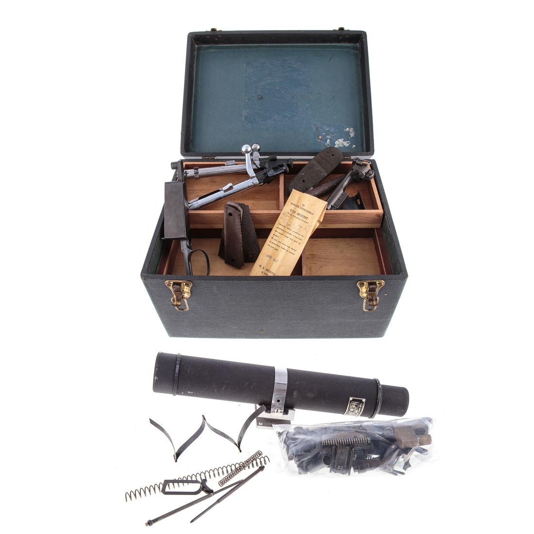 Large Group of Gun Parts: Includes Weaver scope mounts, 2 possibly 1903 Springfield rifle bolts,Colt and Franzite grips, trigger assembly, Custom wood grips, recoil springs, a Saturn telescope, etc.