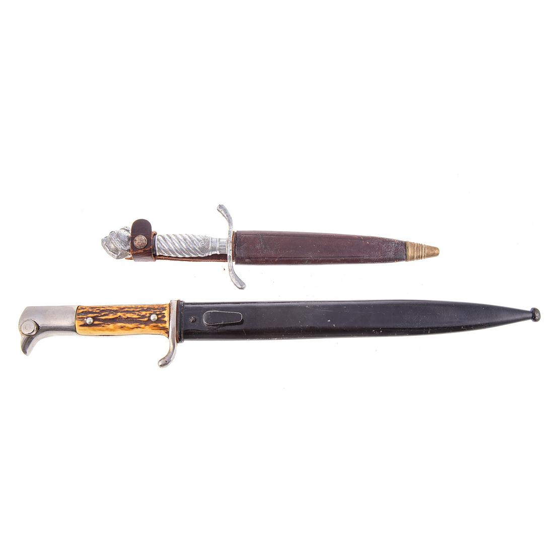 German K98 Stag Handled Bayonet: With scabbard, no markings, no edge to blade so possibly a reproduction along with a Korium German collectible Dirk with sheath