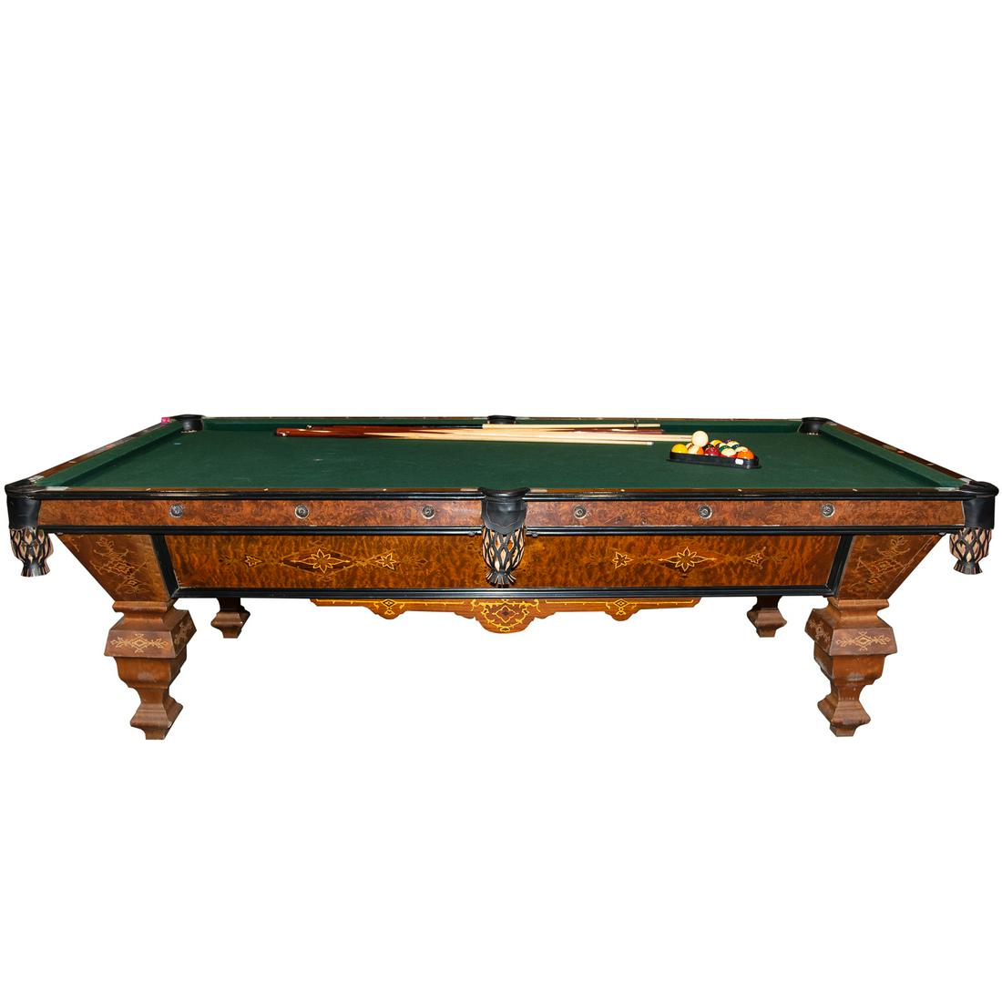 Brunswick Victorian Style Monarch Billiards Table: Brunswick-Balke-Collender Co. patented 1892, premier pool table with rosewood inlaid case, with ebonized edging, having brass rosettes, leather pockets, felt stretched over four- piece slate. 34 in. H