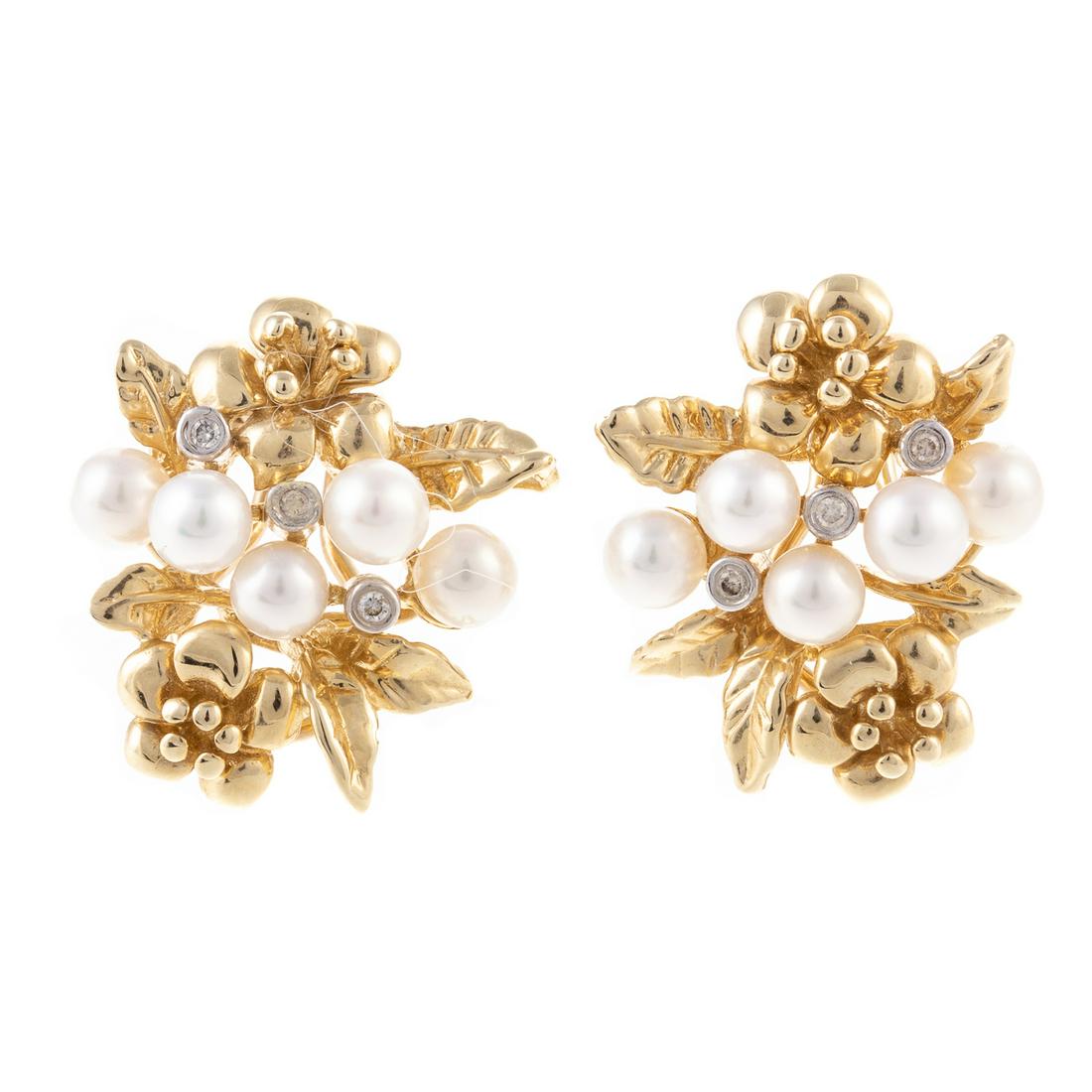 A Pair of Pearl & Diamond Floral Earrings in 14K: 14K yellow gold floral cluster earrings featuring cultured pearls with high luster measuring 5.0 mm with diamond accents within the flower design, post with Omega clip backs, 1 in. L, 11.3 grams