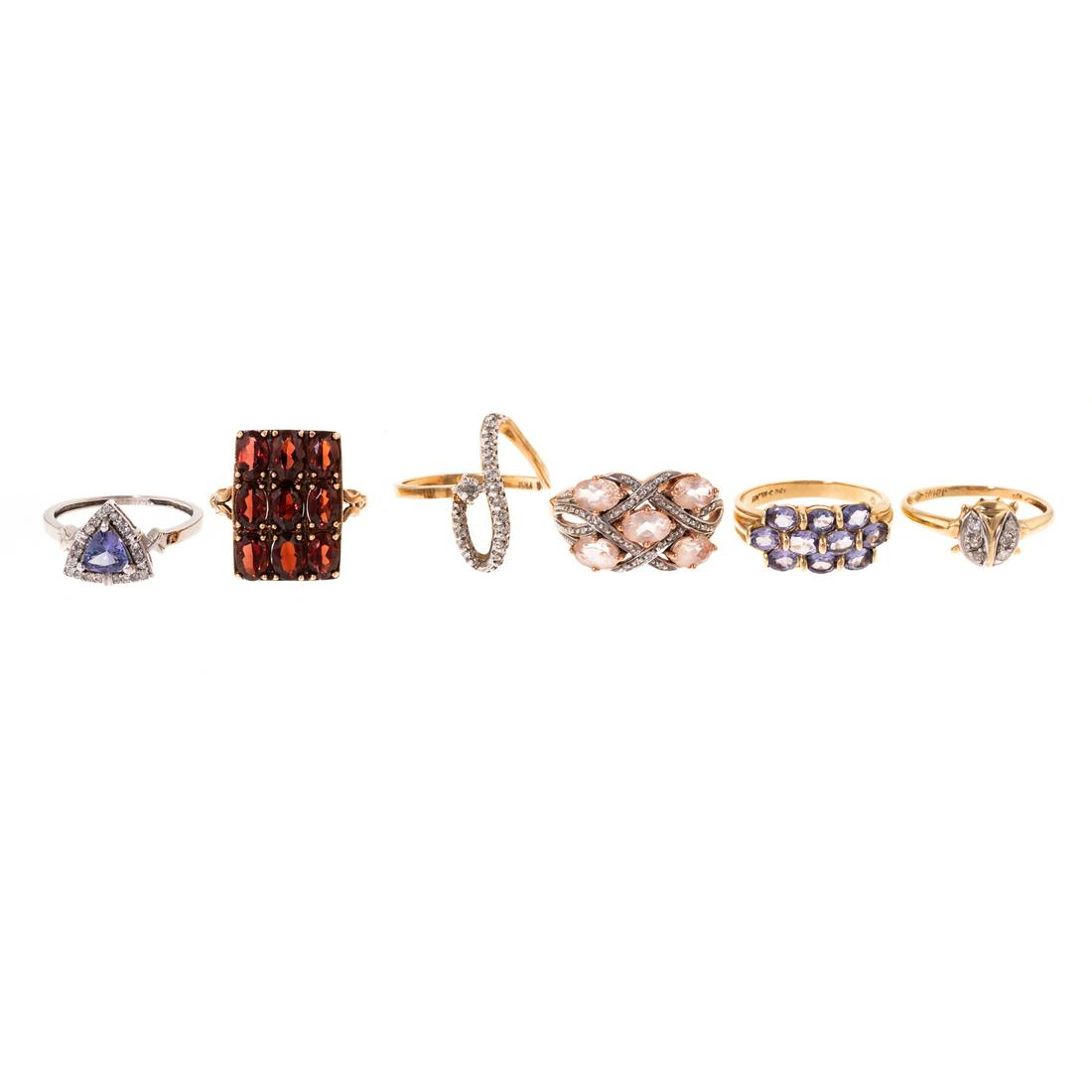 A Collection of Gold Gemstone Rings (1 of 11)