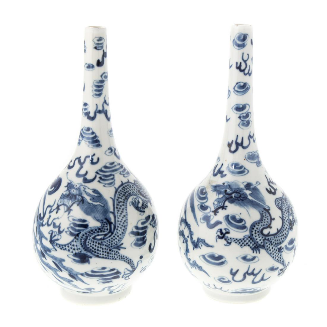 A Pair Chinese Export Blue/White Pencil Neck Vases: Late 19th century; decoration of dragon and phoenix amongst clouds, with character mark, 10 1/2 in. H.