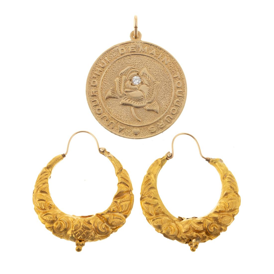 A Pair of 14K Hoops & 14K Diamond Rose Pendant: 1) 14K yellow gold hoop earrings featuring decorative repousse design, hinged closures, 1.5 in. L, and 2) 14K yellow gold circular pendant featuring a rose and centering a full cut diamond, "Aujourd'h