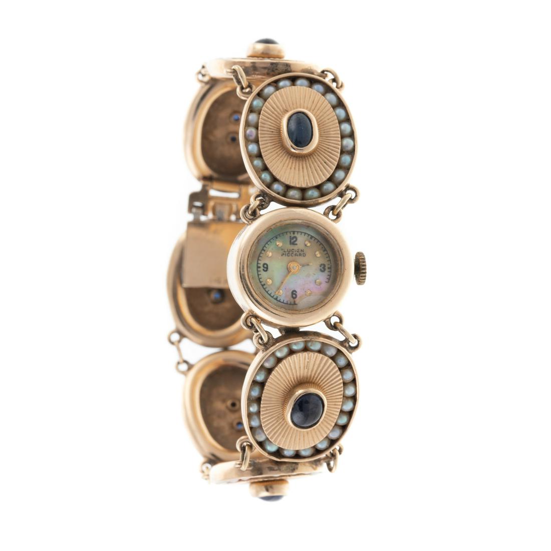 A 1950s Lucien Piccard 14K Watch with Sapphire Links (1 of 6)