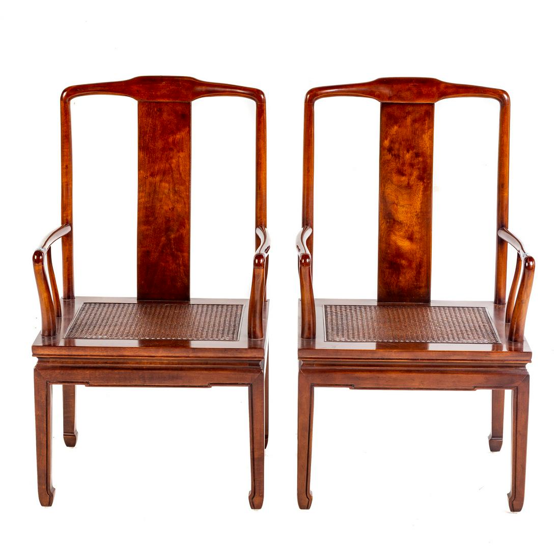 A Pair of Henredon Mahogany Arm Chairs: 20th century; with cane seats. 40 in. H., 23 in .W., 22 in. D.