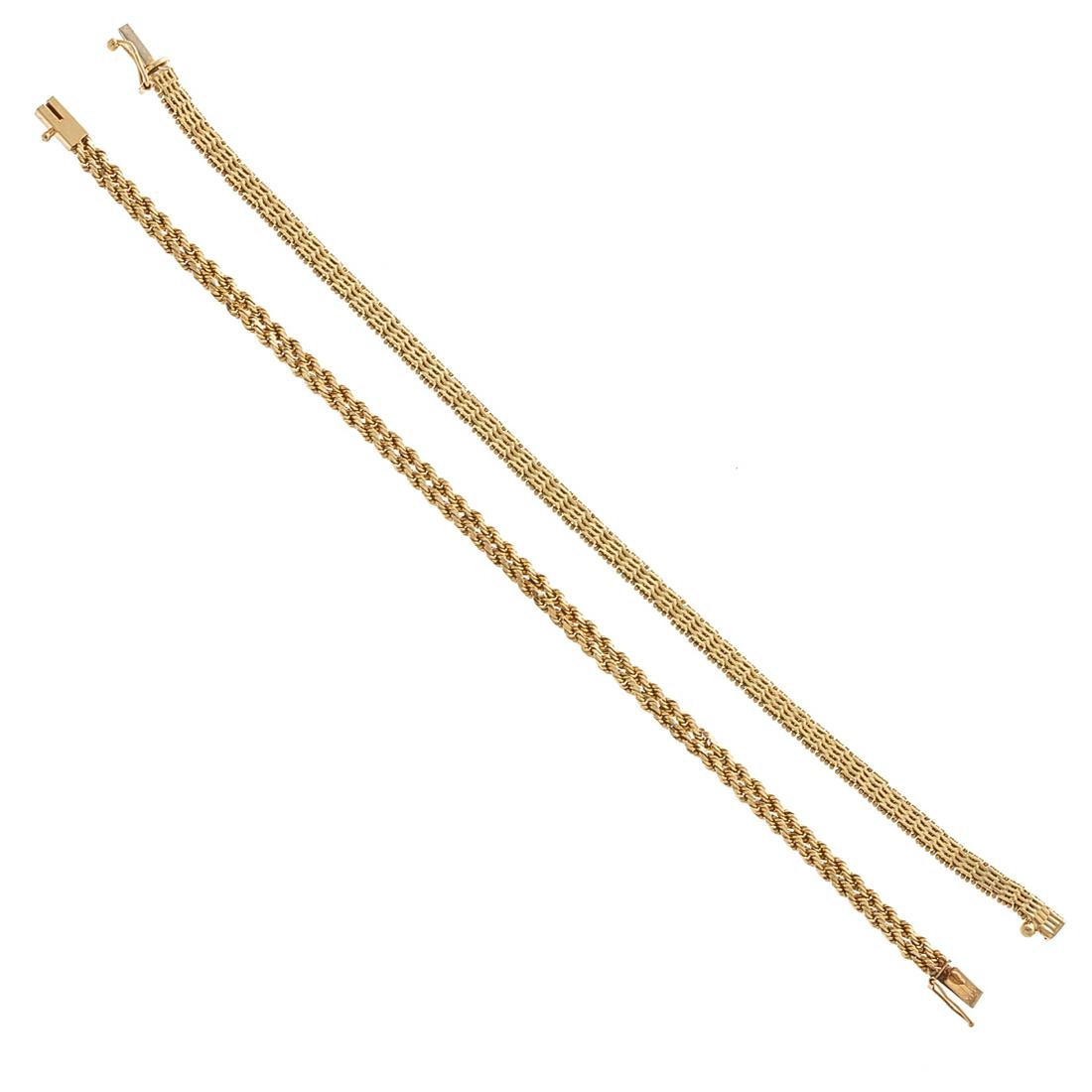 Two Solid Chain Link Bracelets in 14K: 1) 14K yellow gold double row rope chain bracelet with box clasp and safety latch, 7 in. L and 2) 14K yellow gold woven link bracelet with box clasp and safety latch, 7 in. L, 16.1 grams tw