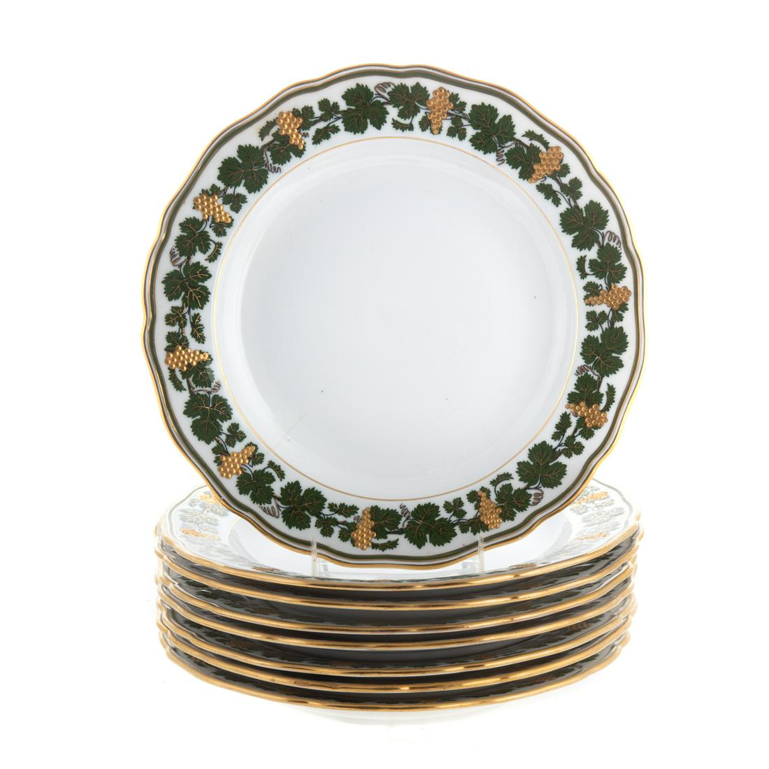 Eight Meissen Porcelain Grapevine Plates: 20th century; scalloped edge plates with grape leaf border and raised gilt grape cluster decoration, 9 3/4 in. Diam., with stamp of Boston retailer. From the family and descendents of Charles Potts Ta