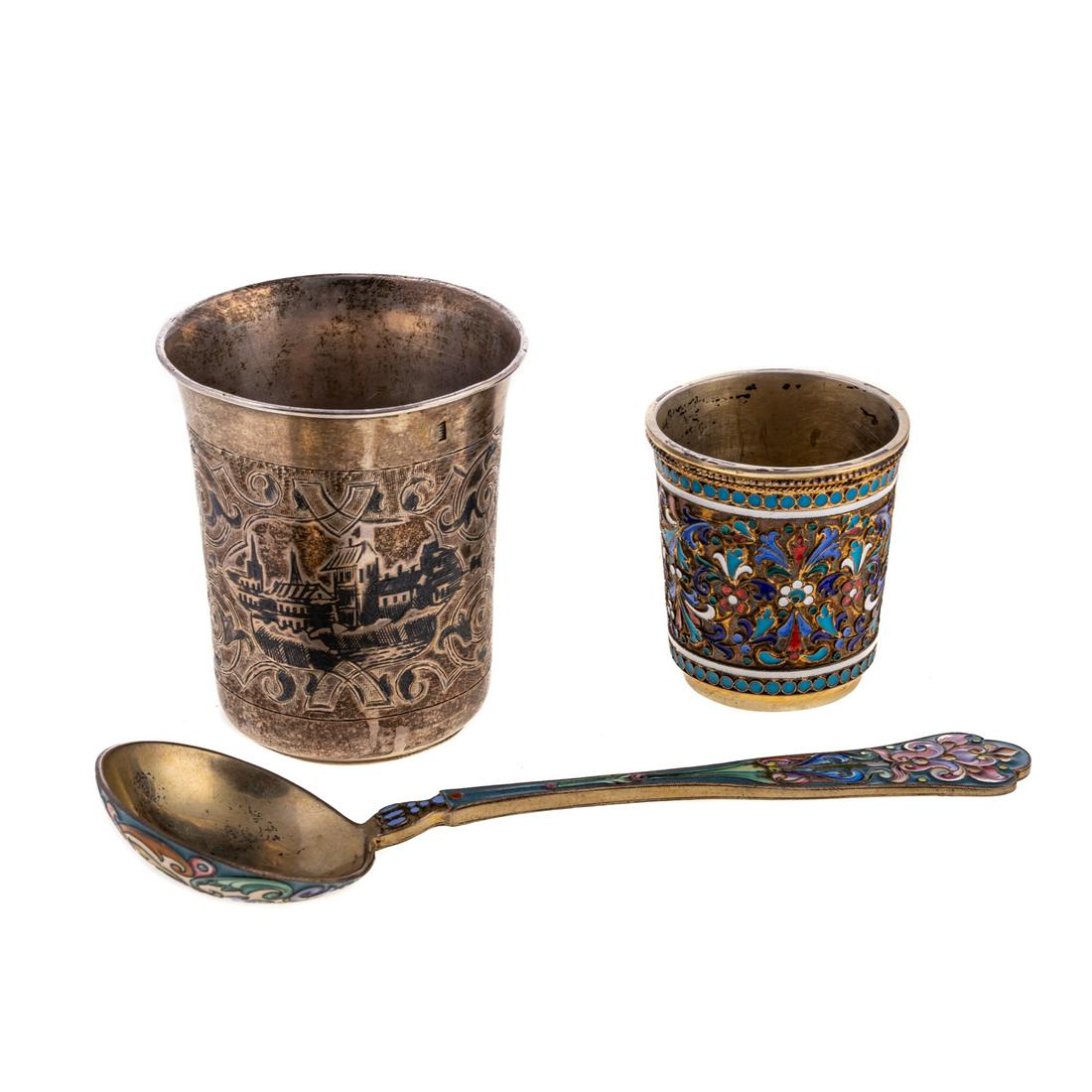 Three Pieces Russian Silver: 84 silver standard; including an enameled tea caddy spoon, with gilt bowl, Moscow kokoshnik mark, 6 5/8 in. L; enameled gilt vodka cup, Anatoly Apollonovich Artsybashev 189* Moscow assay mark, Ivan Sa