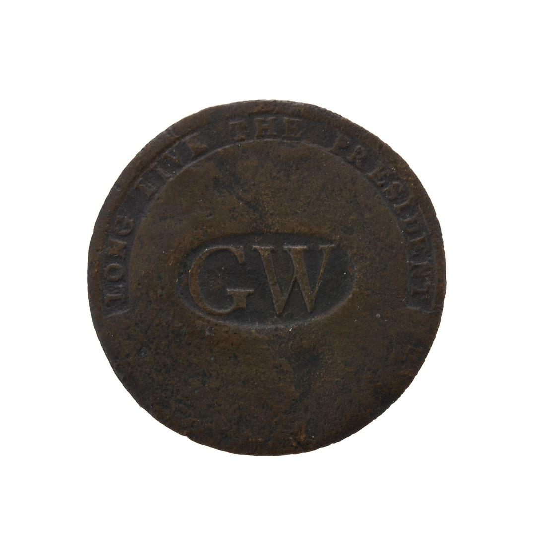 George Washington Inaugural Button, 1789: Cobb #5: A brass disk button centering the letters "GW" in an oval, 8 x 16 mm., "Long Live the President" impressed around the edge; 1 5/16 in. diam. From the estate of a Maryland collector. Purchased