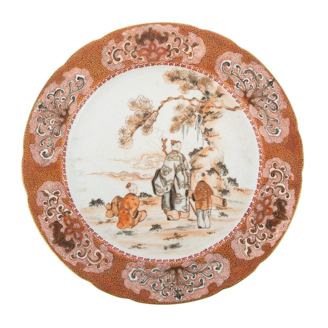 Japanese Kutani Porcelain Plate: 19th century; high quality porcelain plate with gilt and foliate with bat border and central scene with sage and students in fanciful garden, five red character mark on verso, 9 1/2 in. Diam. Estate o