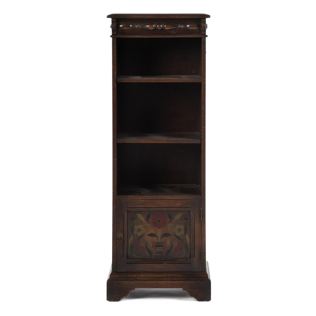Kittinger Elizabethan Style Painted Narrow Bookcas: Small bookcase with two adjustable shelves, floral painted cabinet door at base, 47 in. H., 17 in. W., 11 in. D.