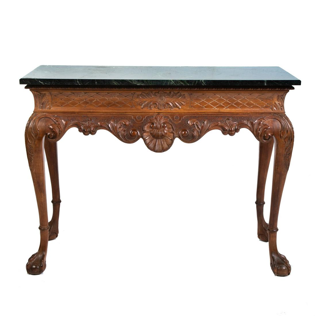 Chippendale Style Marble Top Console Table: 20th century; variegated green marble top with elaborate shell and foliate carved base, ball and claw feet, 31 in. H., 41 in. W., 18 in. D.