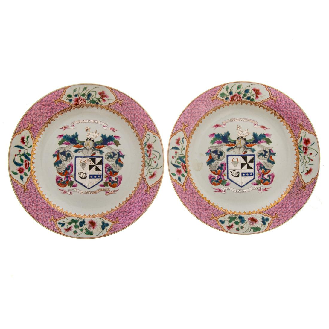 Two English Market Chinese Export Armorial Chargers: Yongzheng Era, circa 1730 bearing the arms of Campbell,with motto "Memenie Deus Dabit Veao' and having cherry blossom diaper border with Famille Rose floral vignettes and impressively large and intric