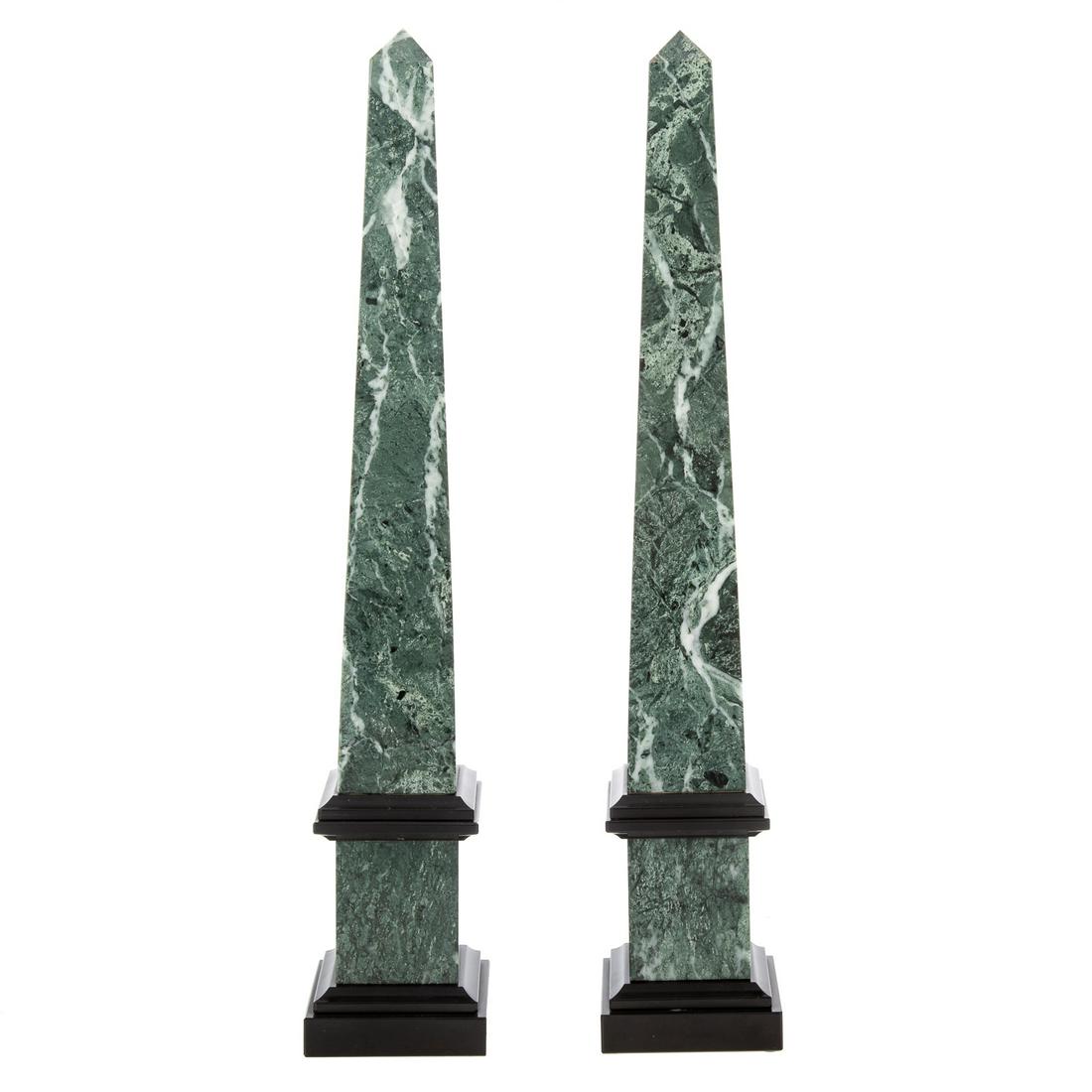 A Pair of Classical Style Onyx Obelisks: 20th century; retailed by Baker, Knapp and Tubbs, 20 in. H.