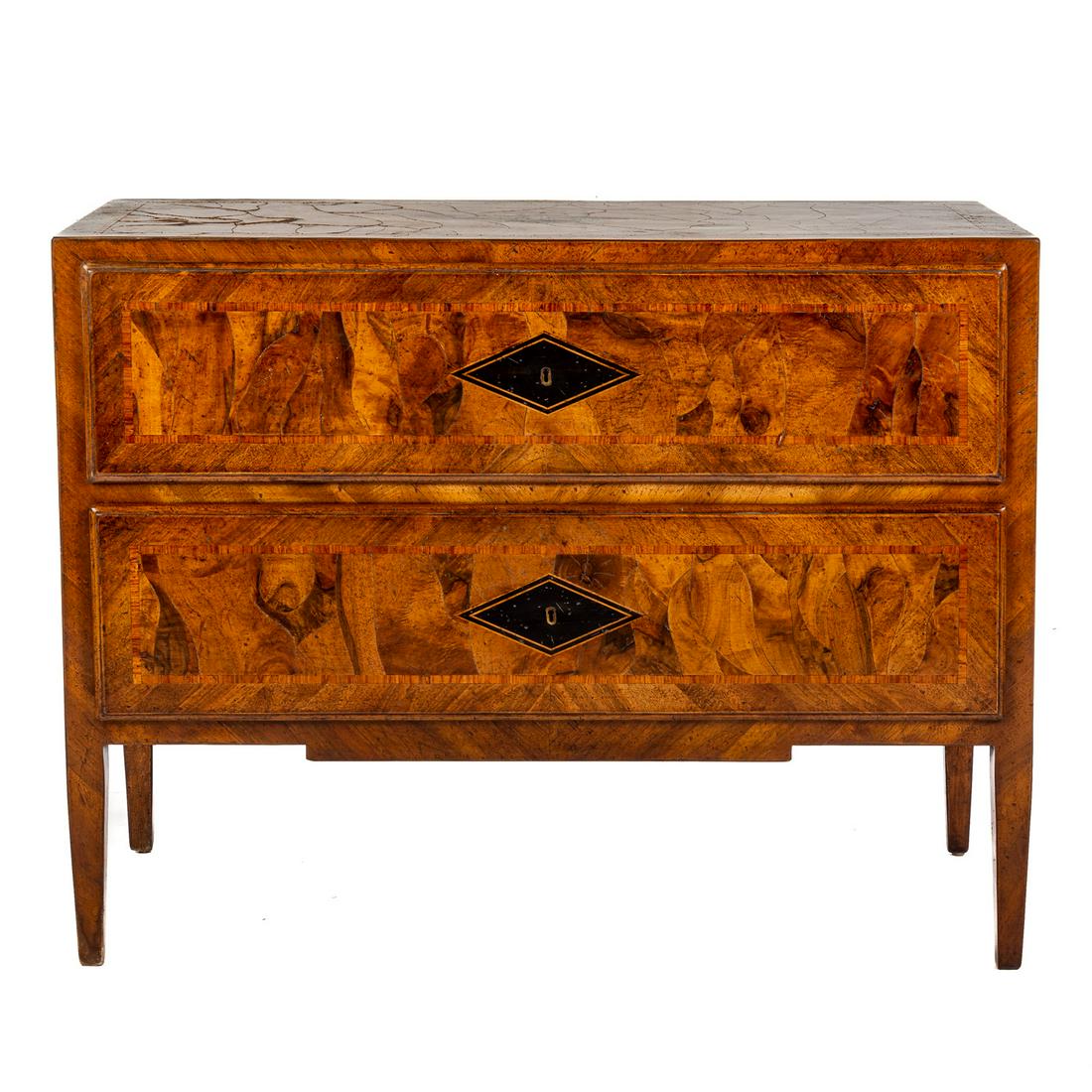 Italian Walnut Oyster Shell Inlaid Commode: With banded and inlaid diamond panels on top and drawer fronts, having two long drawers, with square tapered legs, 36 in. H., 43 in. W., 21 1/2 in. D. From Kevin and DJ Plank's former historic Georget