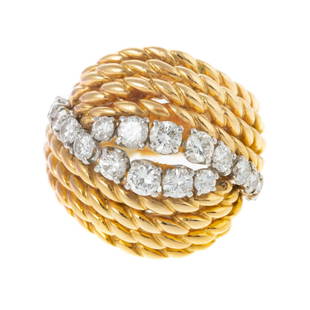 A Vintage French Diamond Ring in 18K: 18K yellow gold ring, made in France, bombe style with twisted ropes, eighteen round-cut graduated diamonds prong set, weighing approx. 1.00 ctw with an average color grade of F-G and an average