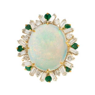 An Opal, Emerald & Diamond Ring in 18K: 18K yellow gold ring featuring an oval opal with green, yellow, and orange play-of-color, weighing approx. 9.00 cts, surrounded by baguette and round cut diamonds, weighing approx. 1.50 ctw, with