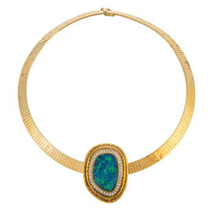 An Extraordinary Opal & Diamond Slide in 18K: 18K yellow gold slide pendant featuring a very fine boulder opal with vibrant blue and green play-of-color bezel set in center of slide with full-cut diamonds bead set in frame around opal along with