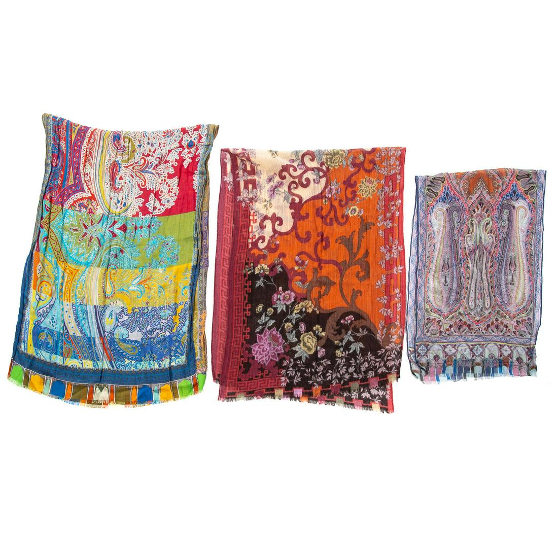 Three Etro Silk, Wool and Chiffon Mufflers: 1) A blue and multicolor Etro modal and cashmere scarf with paisley motif, fringe and hand rolled edges. Measuring: 67 in. L, 25 in. D 2) a navy and multicolor Etro silk chiffon scarf with paisley mot