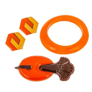 A Carved Bakelite Brooch, Earrings & Bangle: 1) Art Deco orange and brown carved bakelite brooch, 4 in. L, 2) bakelite clip earrings, 1.5 in. W, and 3) Angelique de Paris bangle, 2.75 in. D interior