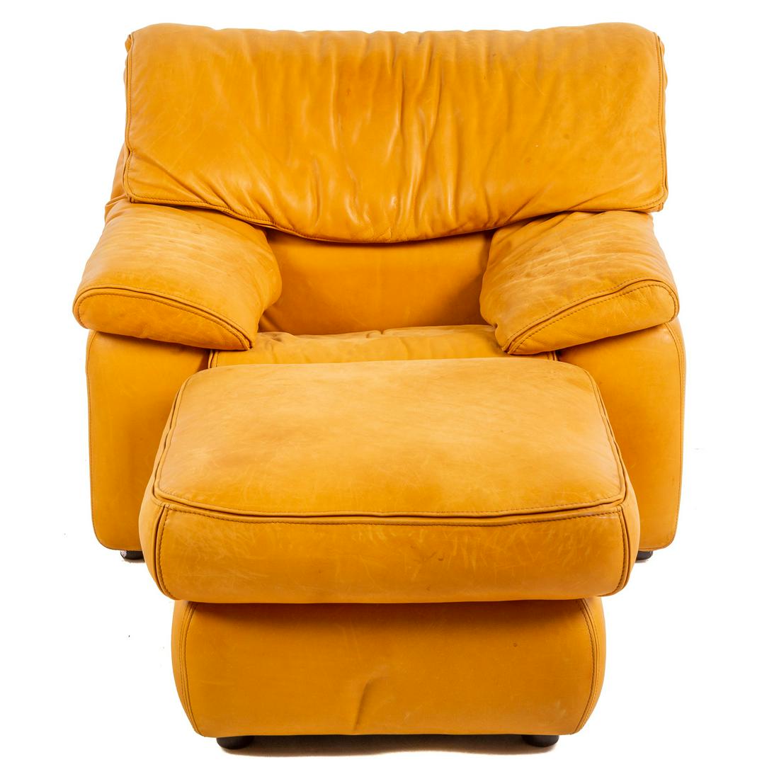 Roche Bobois Leather Chair & Ottoman: Single cushion with removable back cushion, arm chair with matching ottoman, chair is 33 in. H., 39 in. W., 34 in. D., ottoman is 16 in. H., 26 in. Sq., matches lot number 1091.
