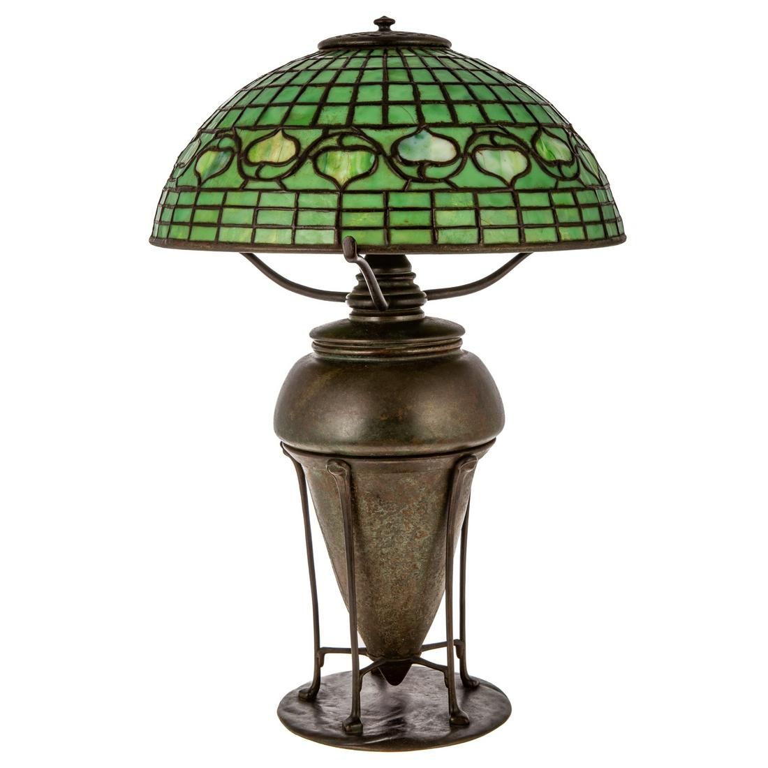 Tiffany Acorn Table Lamp: Circa 1905-10; patinated bronze three socket lamp with conical base and five supports, marked "Tiffany Studios New York 458," 21 in. H. with Acorn leaded glass shade, marked "Tiffany Studios New York,