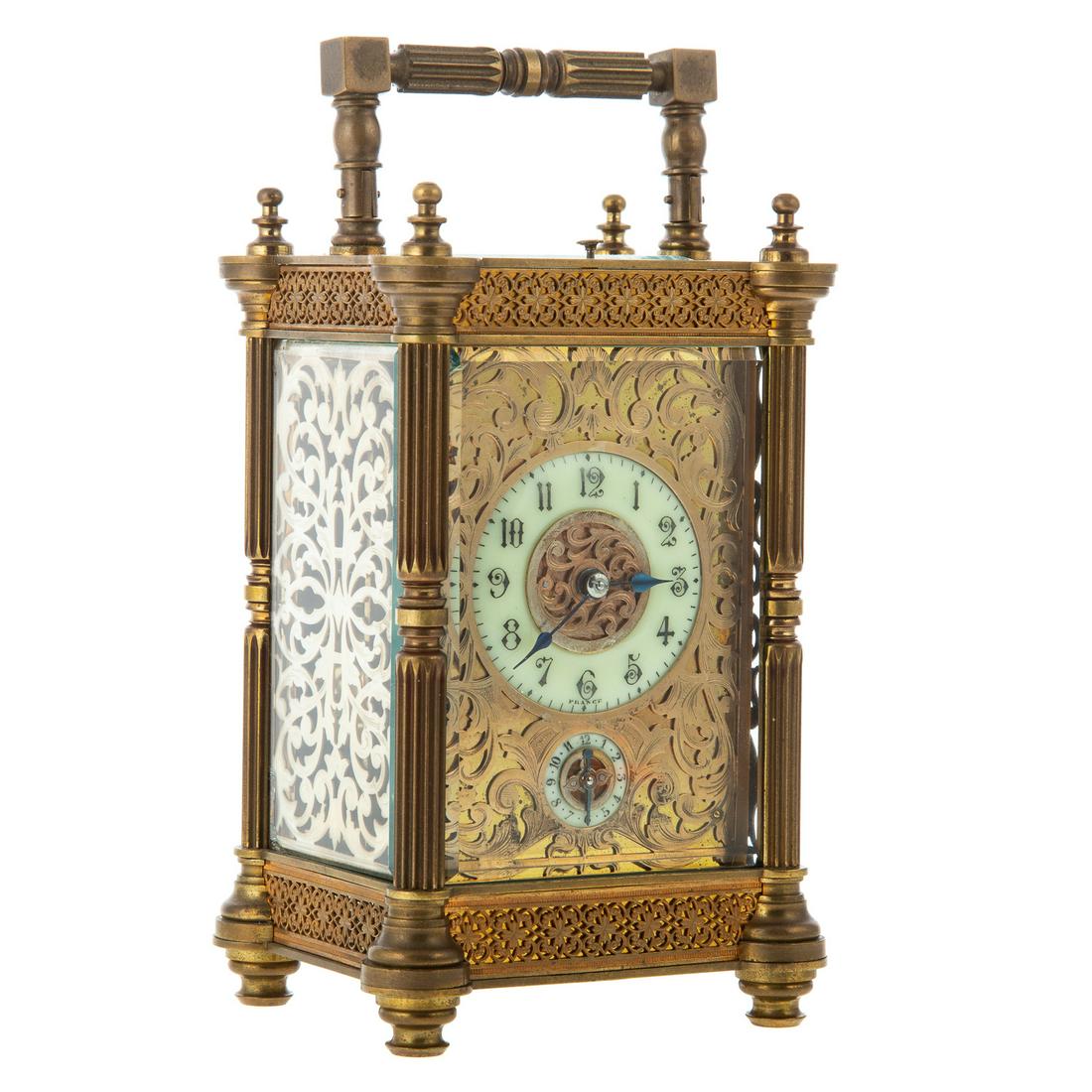 Continental Brass & Glass Carriage Clock: Early 20th century; neo-classical style brass case with beveled glass panels, with reticulated brass front and similar silvered metal sides and turreted corners with reeded columns, 6 1/4 in. H., 4 in