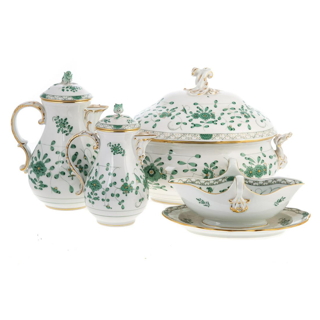 Meissen Green Oriental Flower Dinner Service: Partial dinner service, approximately 112 pieces, comprising; soup tureen and stand, fourteen dinner plates, fourteen soup plates, eight lunch plates, twelve bread plates, fifteen dessert plates, nine