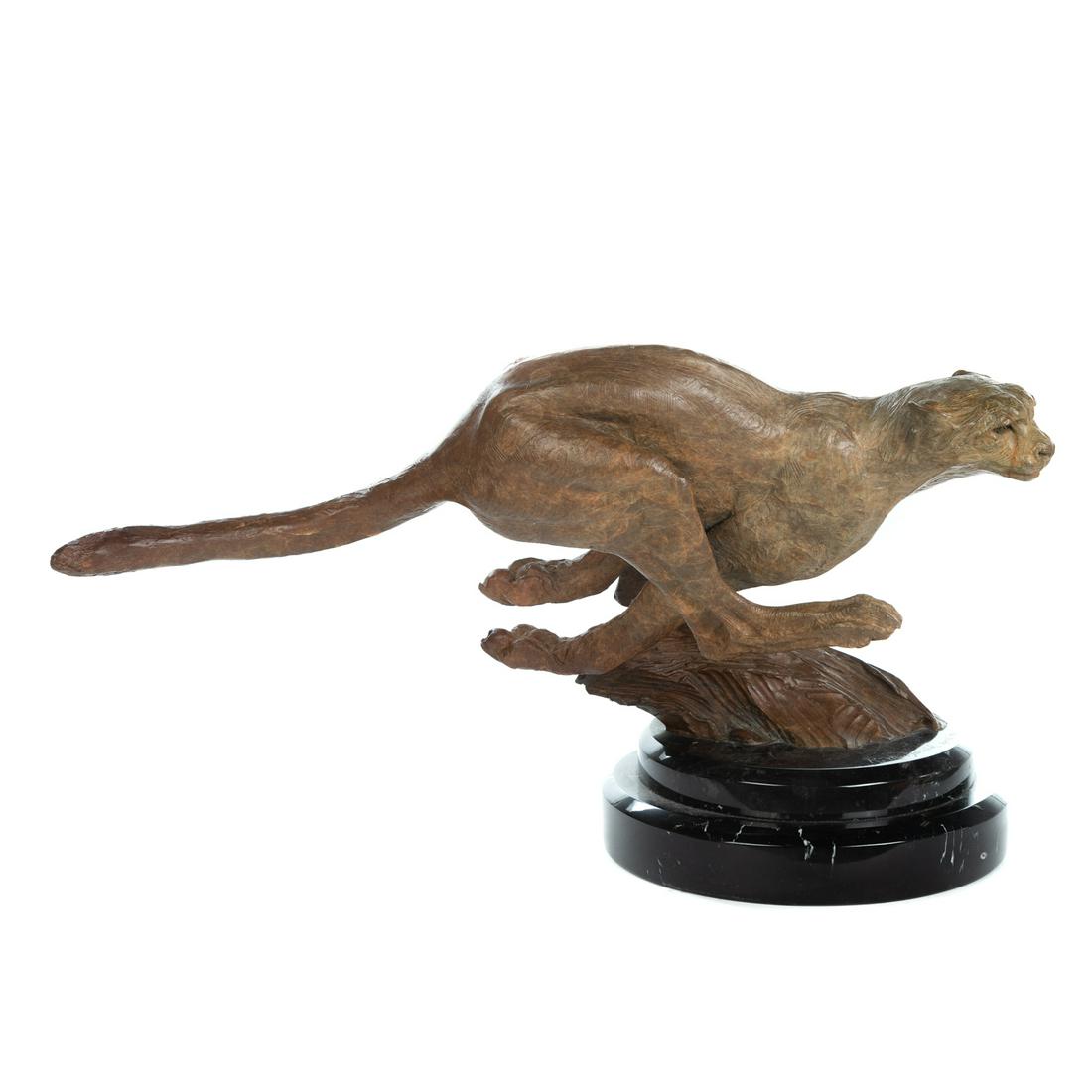 Richard MacDonald. Cheetah, bronze sculpture: (American, 20th century). Bronze figure on round marble base, signed and dated "R. MacDonald "98" on base, approximately 14" H x 25" W x 14" D.